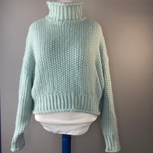 mint green turtleneck sweater